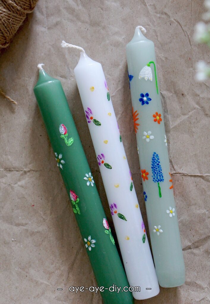 Kerzen bemalen mit Wachsstiften - Blumenmuster Frühling